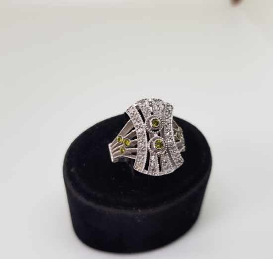 PIRLANTA VE SİTRİN TAŞLI EĞRİ BAGET MODEL YÜZÜK