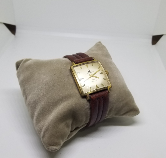 DUGENA MARKA ALTIN KAPLAMA KOL SAATİ