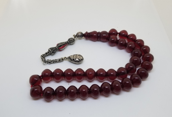 ÇUBUK PARÇADAN YAPILMIŞ GÜMÜŞ PÜSKÜLLÜ SIKMA KEHRİBAR TESPİH