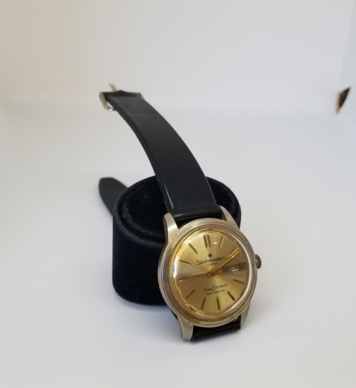 STARMASTER MARKA ALTIN KAPLAMA KURMALI VE TAKVİMLİ KOL SAATİ