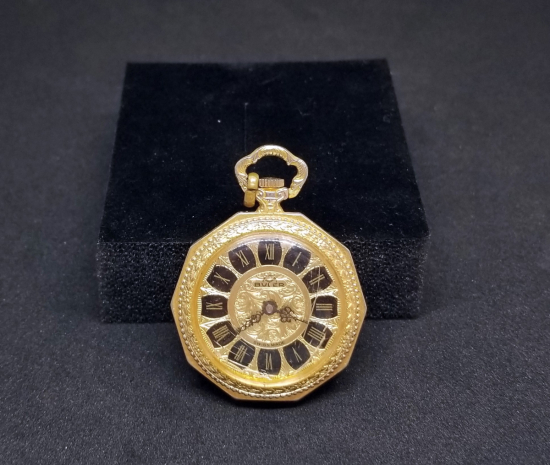 ALTIN KAPLAMA KURMALI ANTİKA KOLYE SAAT