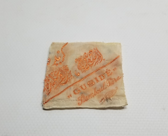 OSMANLI DÖNEMİ NADİR OSMANLICA VE FRANSIZCA YAZILI İPEK KIYAFET ETİKETİ