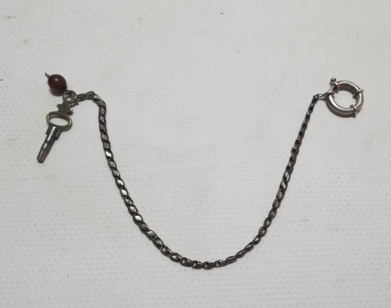 BAKLALI FORMDA YAPILMIŞ ANTİKA GÜMÜŞ CEP SAATİ KÖSTEĞİ