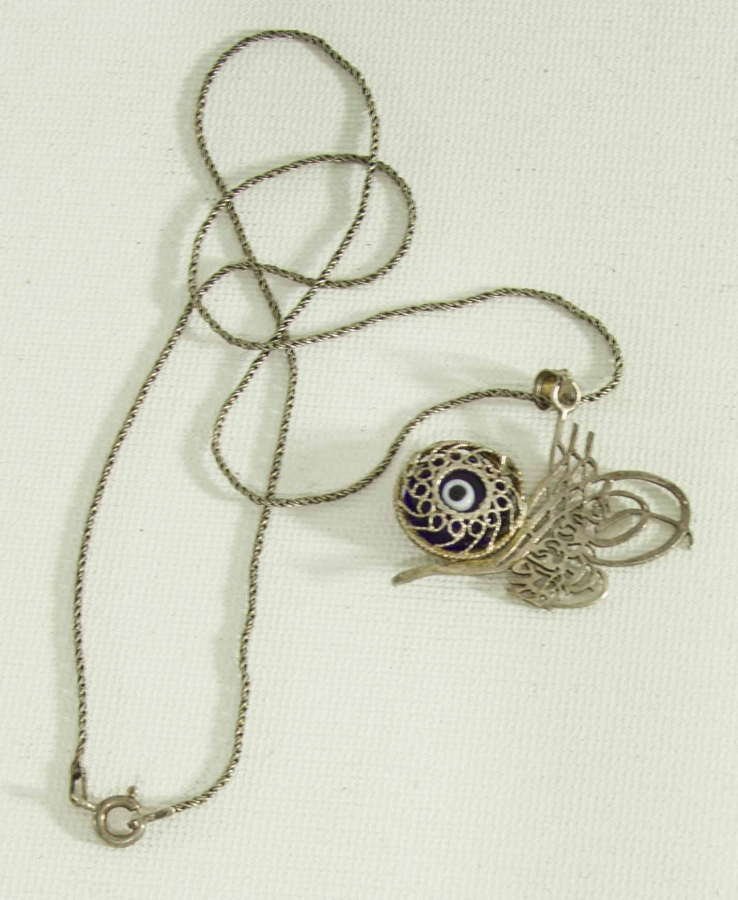 KIL TESTERE İŞÇİLİKLİ TUĞRA FORMLU GÜMÜŞ KOLYE