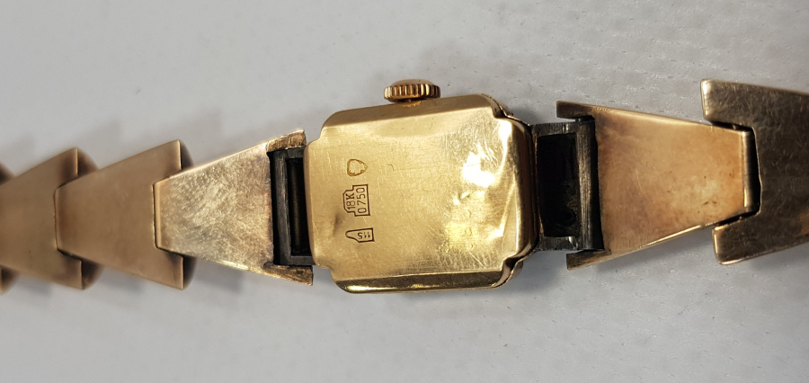 YAKUT VE ELMAS TAŞLARLA SÜSLÜ ALTIN KOL SAATİ