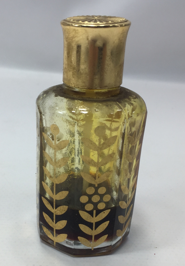 İÇİNDE KOKUSU İLE ALTIN VARAKLI BEYKOZ KOKU ŞİŞESİ