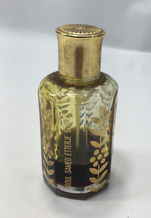 İÇİNDE KOKUSU İLE ALTIN VARAKLI BEYKOZ KOKU ŞİŞESİ