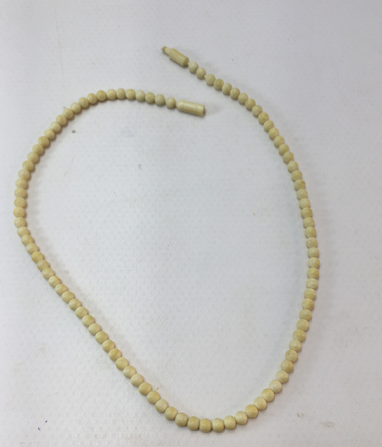 1900 BAŞLARI FİL DİŞİNDEN MAMUL KOLYE