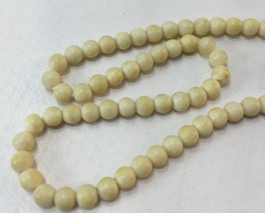 1900 BAŞLARI FİL DİŞİNDEN MAMUL KOLYE