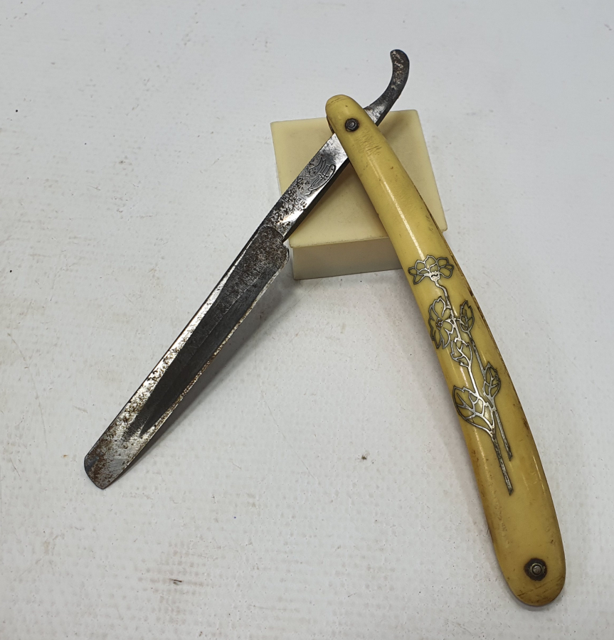 MORS DİŞİ ÜZERİNE GÜMÜŞ ÇAKMA İŞLEMELİ USTURA