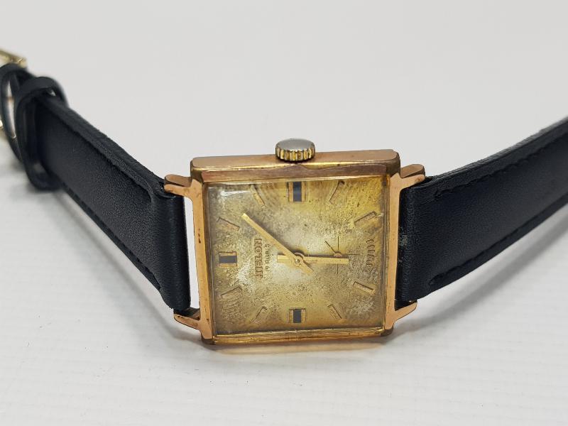 ALTIN KAPLAMA HISLON MARKA KOL SAATİ 