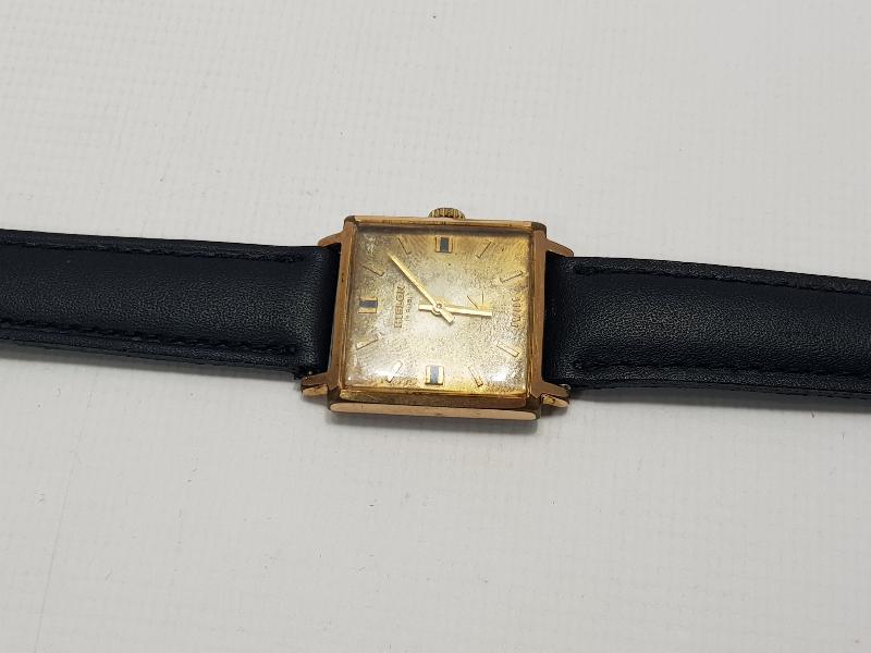 ALTIN KAPLAMA HISLON MARKA KOL SAATİ 