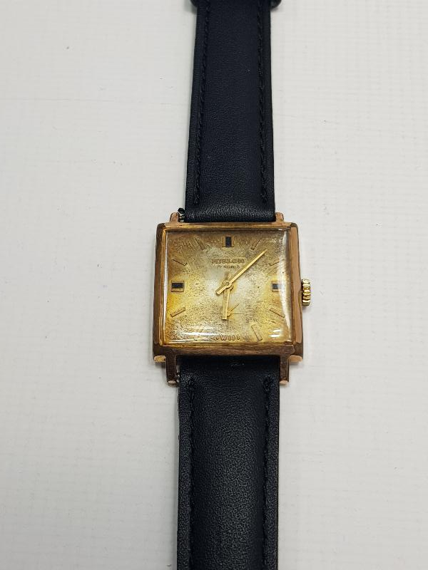 ALTIN KAPLAMA HISLON MARKA KOL SAATİ 