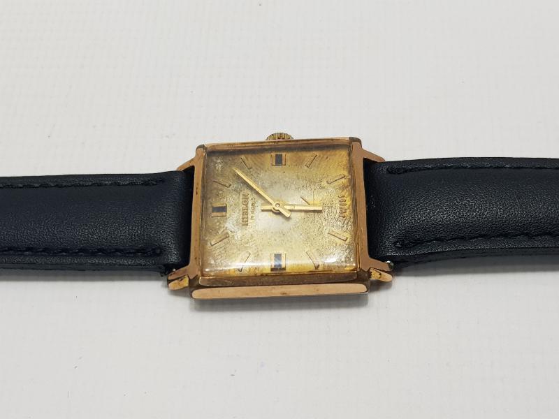 ALTIN KAPLAMA HISLON MARKA KOL SAATİ 