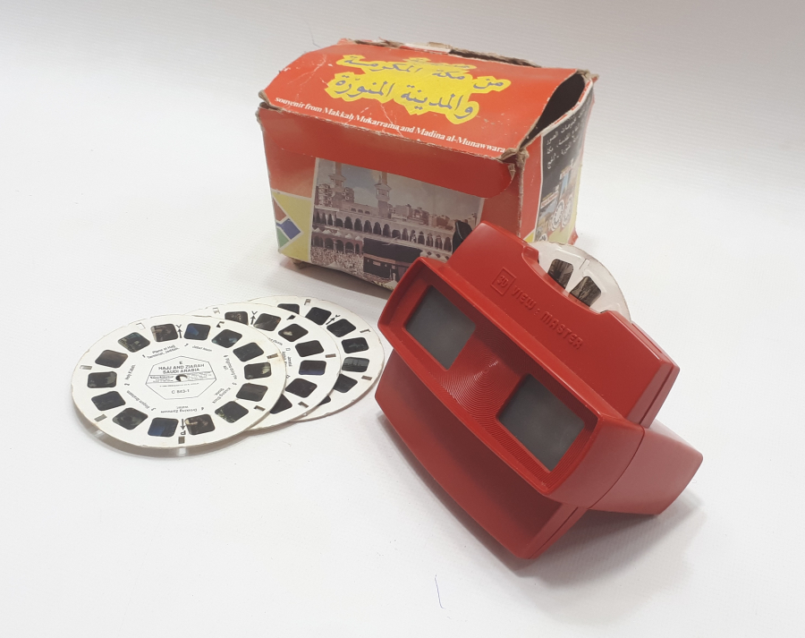 İÇİNDE HAC DAN KARELERİN BULUNDUĞU FİLMLİ MAKİNA