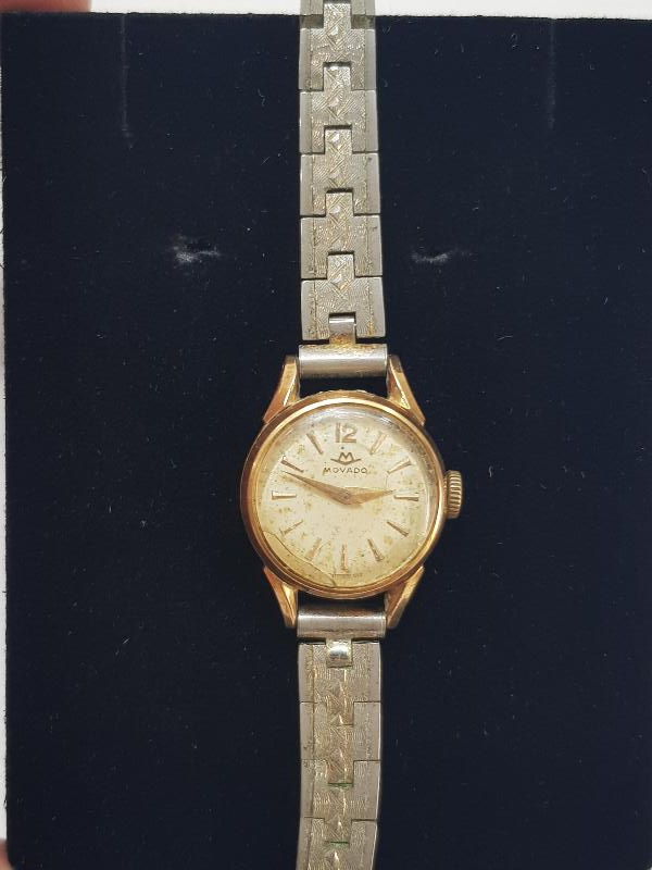 MOVADO MARKA ALTIN KAPLAMA KURMALI KOL SAATİ 