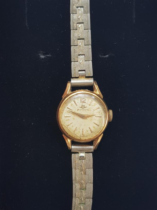 MOVADO MARKA ALTIN KAPLAMA KURMALI KOL SAATİ 