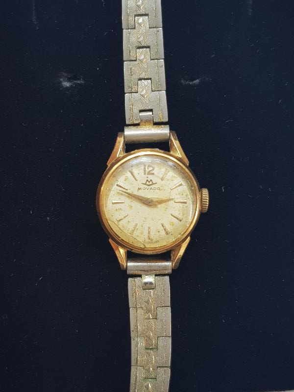 MOVADO MARKA ALTIN KAPLAMA KURMALI KOL SAATİ 