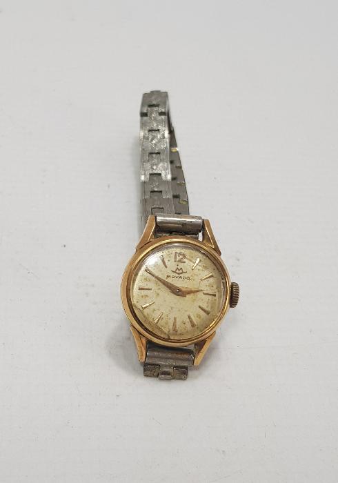 MOVADO MARKA ALTIN KAPLAMA KURMALI KOL SAATİ 