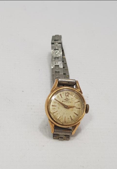 MOVADO MARKA ALTIN KAPLAMA KURMALI KOL SAATİ 