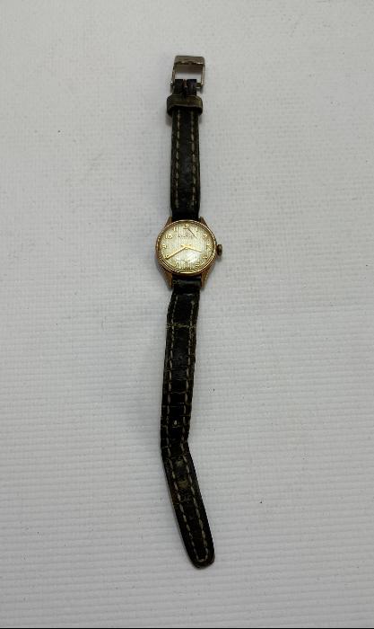 NACAR MARKA ALTIN KAPLAMA KURMALI KOL SAATİ