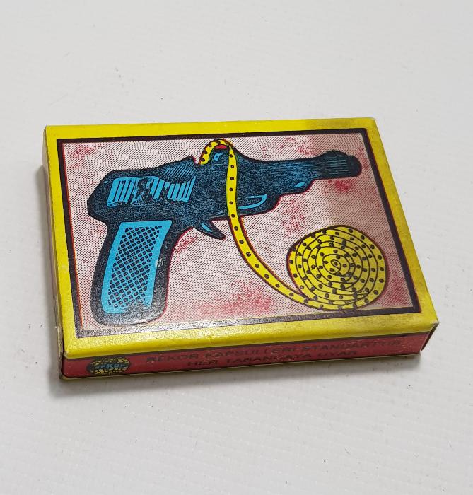 OYUNCAK TARİHİ: REKOR OTOMATİK TABANCA ŞERİT KAPSÜLLERİ KUTUSU