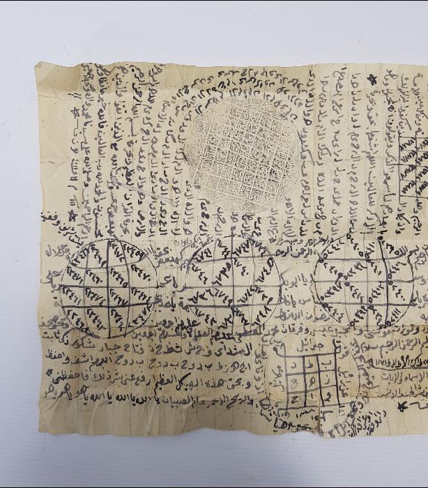 BALMUMLU BEZ MUHAFAZASINDA EL YAZMA TILSIM