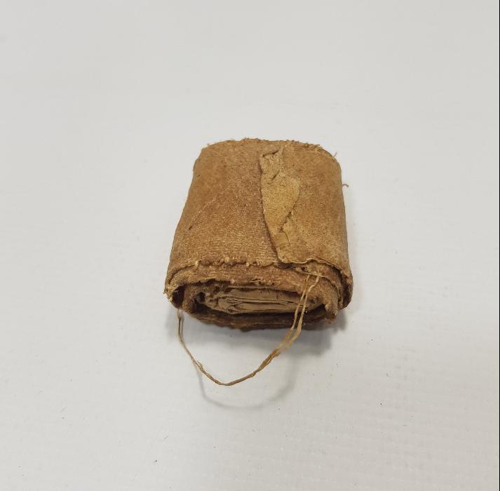 BALMUMLU BEZ MUHAFAZASINDA EL YAZMA TILSIM