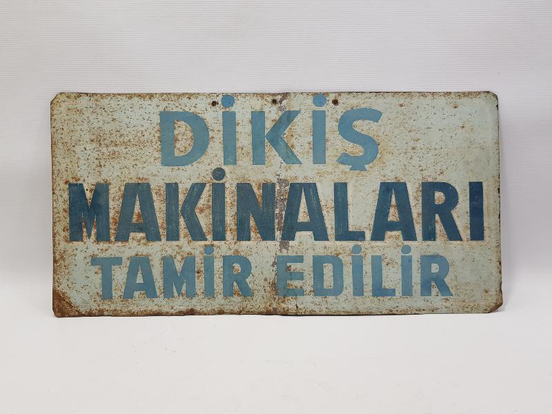 DİKİŞ MAKİNALARI TAMİR EDİLİR YAZILI TABELA