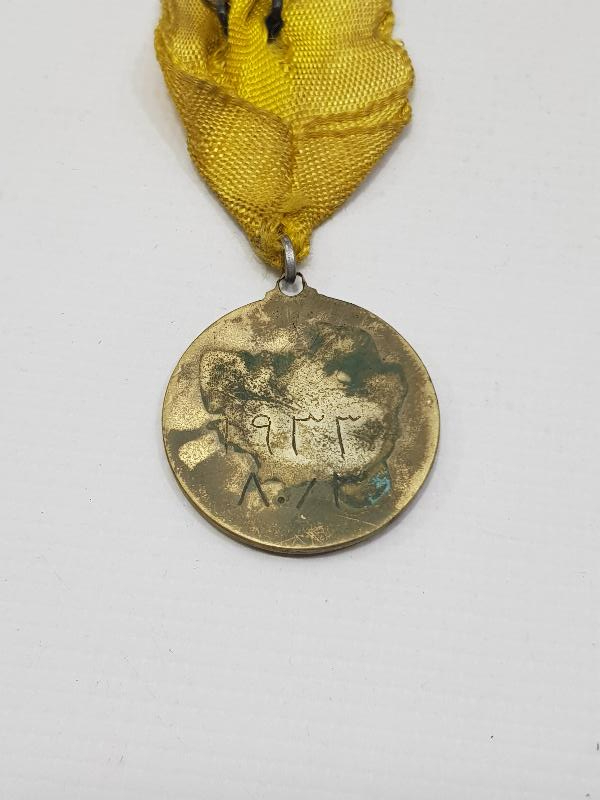 ÜZERİNDE OSMANLICA TARİH BULUNAN GÜREŞ MADALYASI