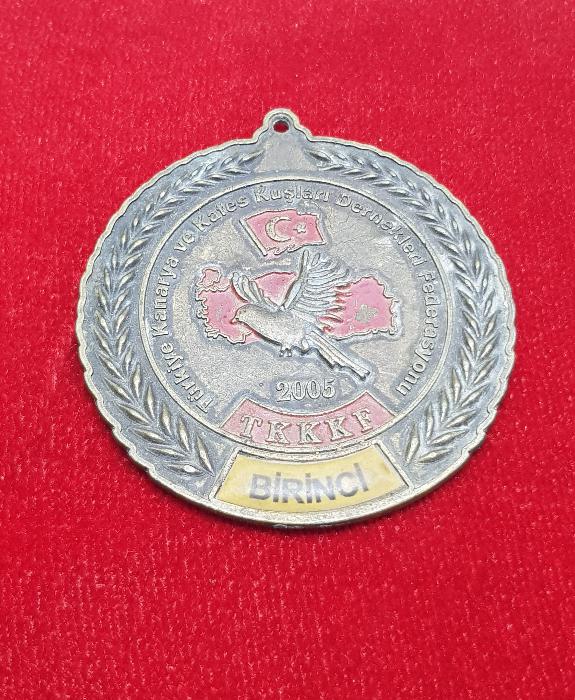 TÜRKİYE KANARYA VE KAFES KUŞLARI DERNEKLERİ FEDERASYONU BİRİNCİLİK MADALYASI