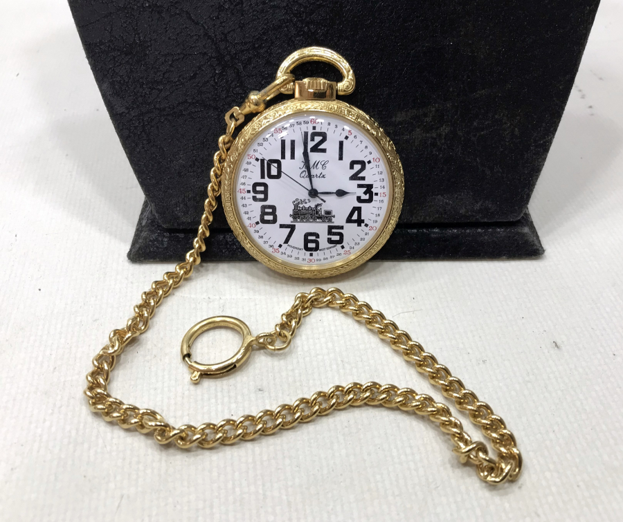 KML MARKA ORİJİNAL KUTUSUNDA VE ÇİL KONDİSYONDA ALTIN KAPLAMA ARKASI TRENLİ ANTİKA CEP SAATİ