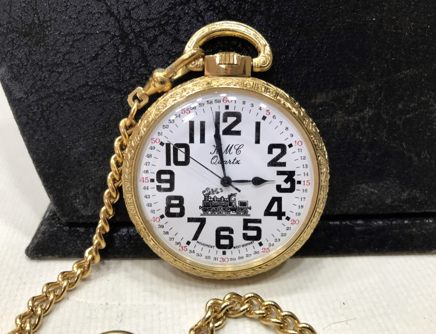 KML MARKA ORİJİNAL KUTUSUNDA VE ÇİL KONDİSYONDA ALTIN KAPLAMA ARKASI TRENLİ ANTİKA CEP SAATİ