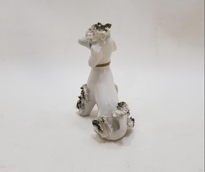 ANTİKA PORSELEN KÖPEK BİBİLOSU