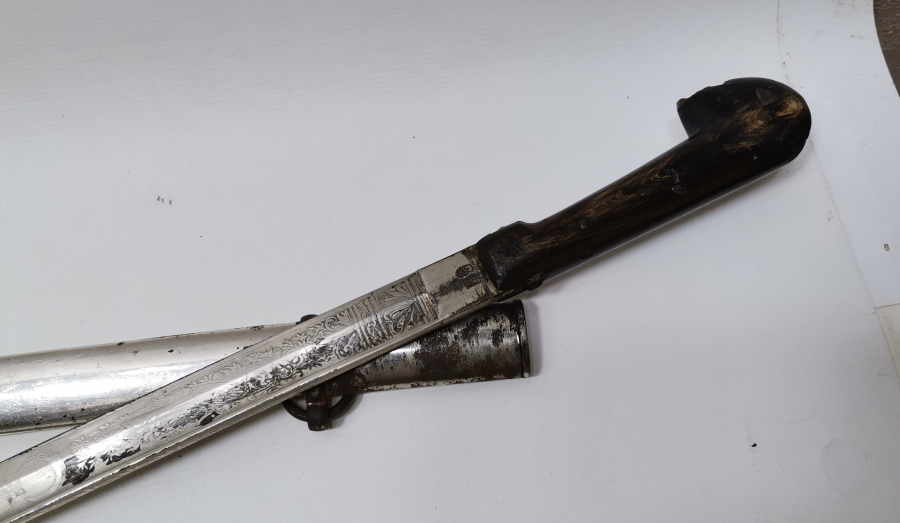 SAPI ŞAŞKA FORMUNDA YAPILMIŞ OSMANLI DÖNEMİ ÖZEL YAPIM SUBAY KILICI