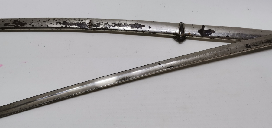 SAPI ŞAŞKA FORMUNDA YAPILMIŞ OSMANLI DÖNEMİ ÖZEL YAPIM SUBAY KILICI