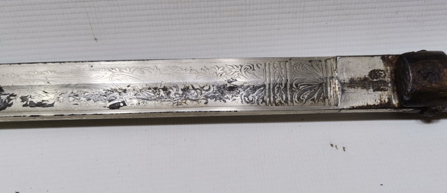 SAPI ŞAŞKA FORMUNDA YAPILMIŞ OSMANLI DÖNEMİ ÖZEL YAPIM SUBAY KILICI