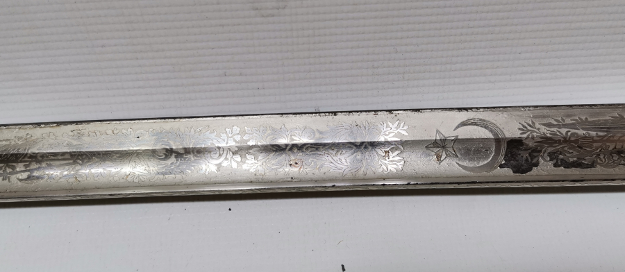 SAPI ŞAŞKA FORMUNDA YAPILMIŞ OSMANLI DÖNEMİ ÖZEL YAPIM SUBAY KILICI