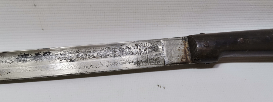 SAPI ŞAŞKA FORMUNDA YAPILMIŞ OSMANLI DÖNEMİ ÖZEL YAPIM SUBAY KILICI