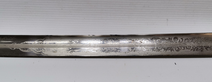 SAPI ŞAŞKA FORMUNDA YAPILMIŞ OSMANLI DÖNEMİ ÖZEL YAPIM SUBAY KILICI