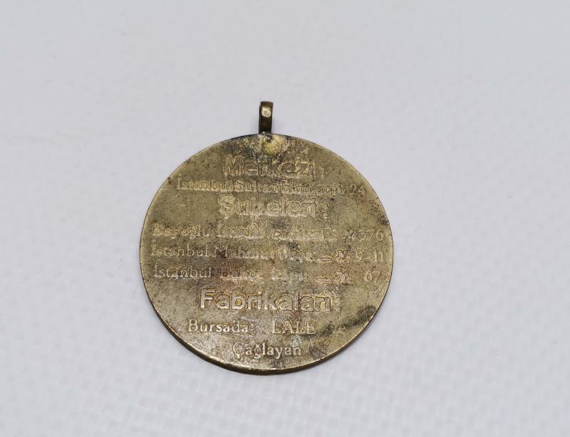 SİPAHİZADE HASAN HÜSNÜ BURSA PAZARI YAZILI DARPHANE BASIMI MADALYON