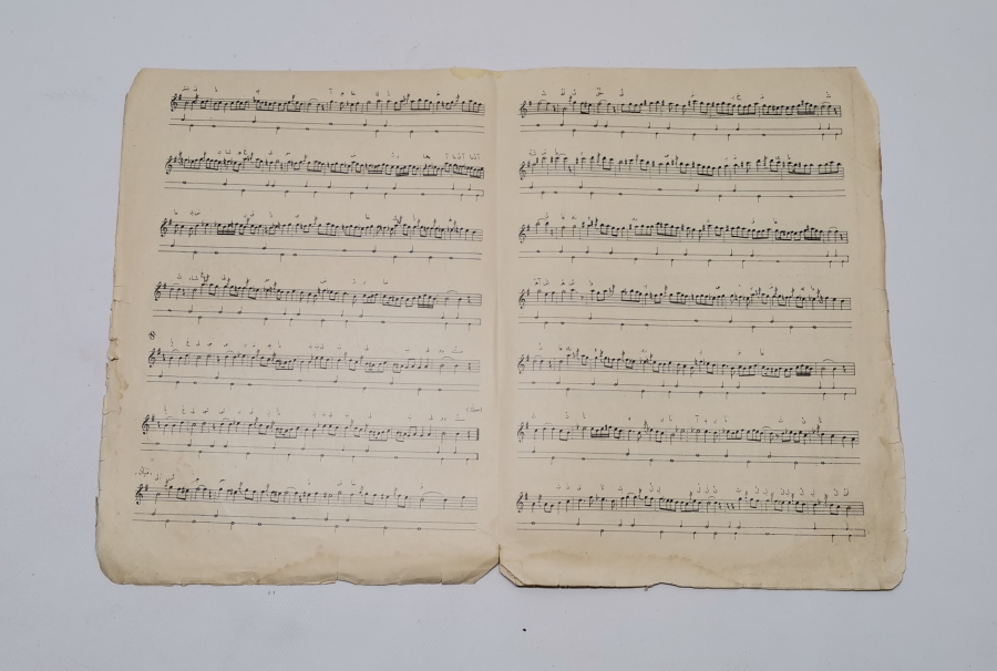 ARKASINDA EHLİ BEYT İMAMLARI İLE İLGİLİ BİR MERSİYE BULUNAN OSMANLI DÖNEMİ NOTA KİTABI