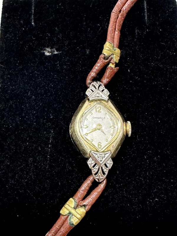 ANTİKA CARAVELLE MARKA ALTIN KAPLAMA KURMALI BAYAN KOL SAATİ 