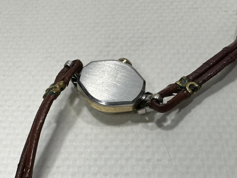 ANTİKA CARAVELLE MARKA ALTIN KAPLAMA KURMALI BAYAN KOL SAATİ 