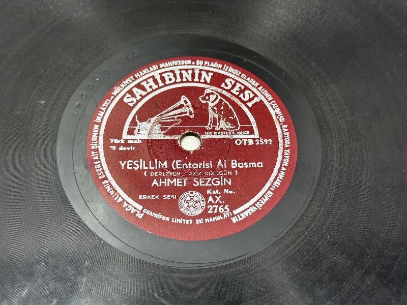 TAŞ PLAK : AHMET SEZGİN 