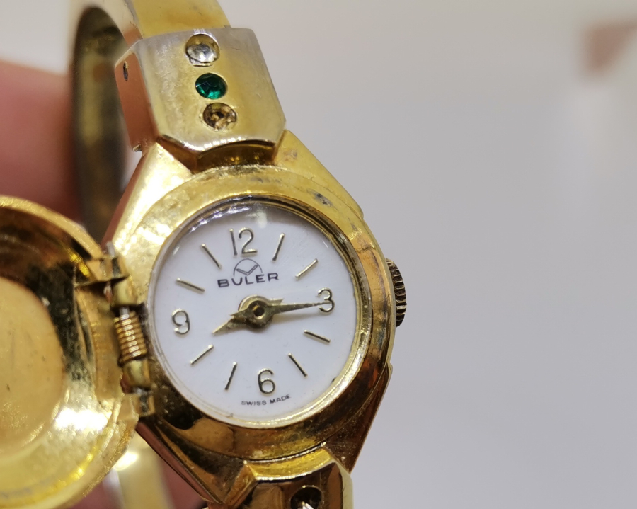 ALTIN KAPLAMA KURMALI ANTİKA KOL SAATİ