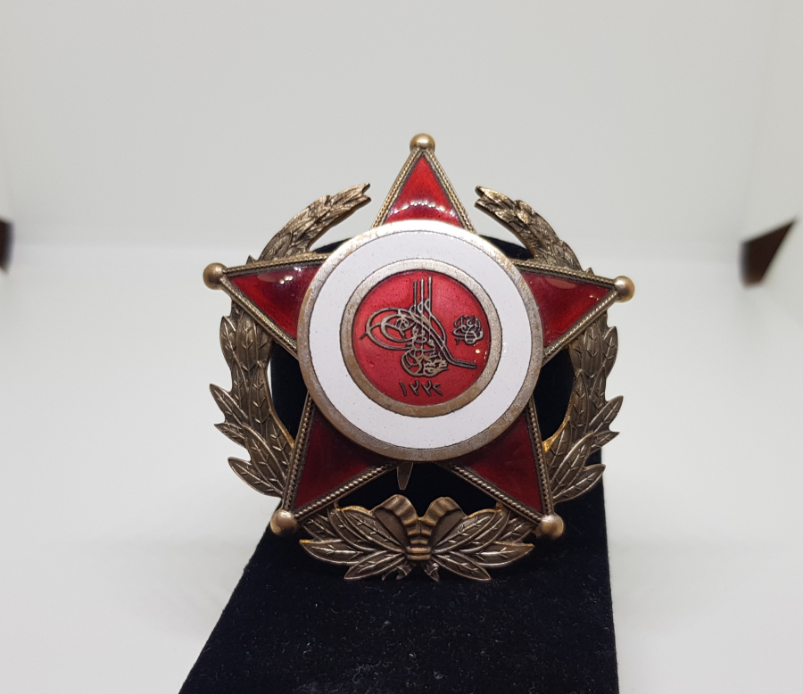 1. DÜNYA SAVAŞI ÇOK NADİR FORMDA MİNELİ HARP MADALYASI