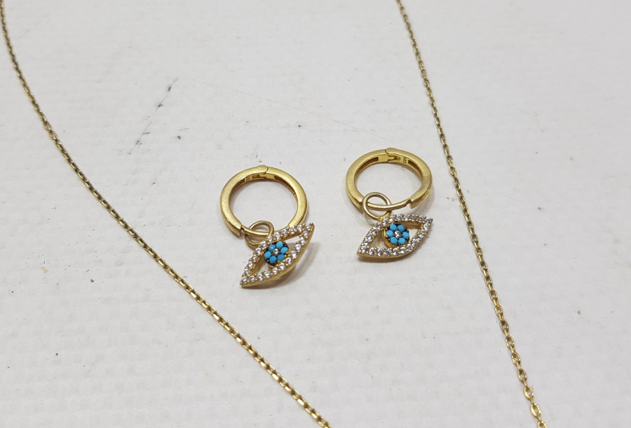 NAZARA KARŞI YAPILMIŞ ÖZEL YAPIM GÜMÜŞ KOLYE TAKIMI