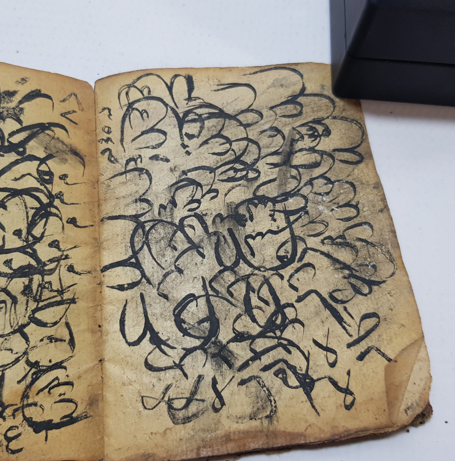 İÇERİSİNDE EBCEDLER VE CİN TASVİRLERİ BULUNAN NADİR EL YAZMA ASKER ENAMI