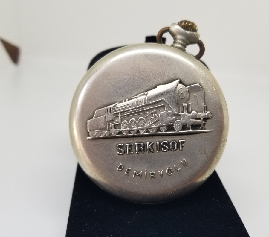 ARKASI TRENLİ SERKİSOF MARKA KURMALI CEP SAATİ